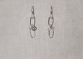 metallic mischief hoops link knot link silver
